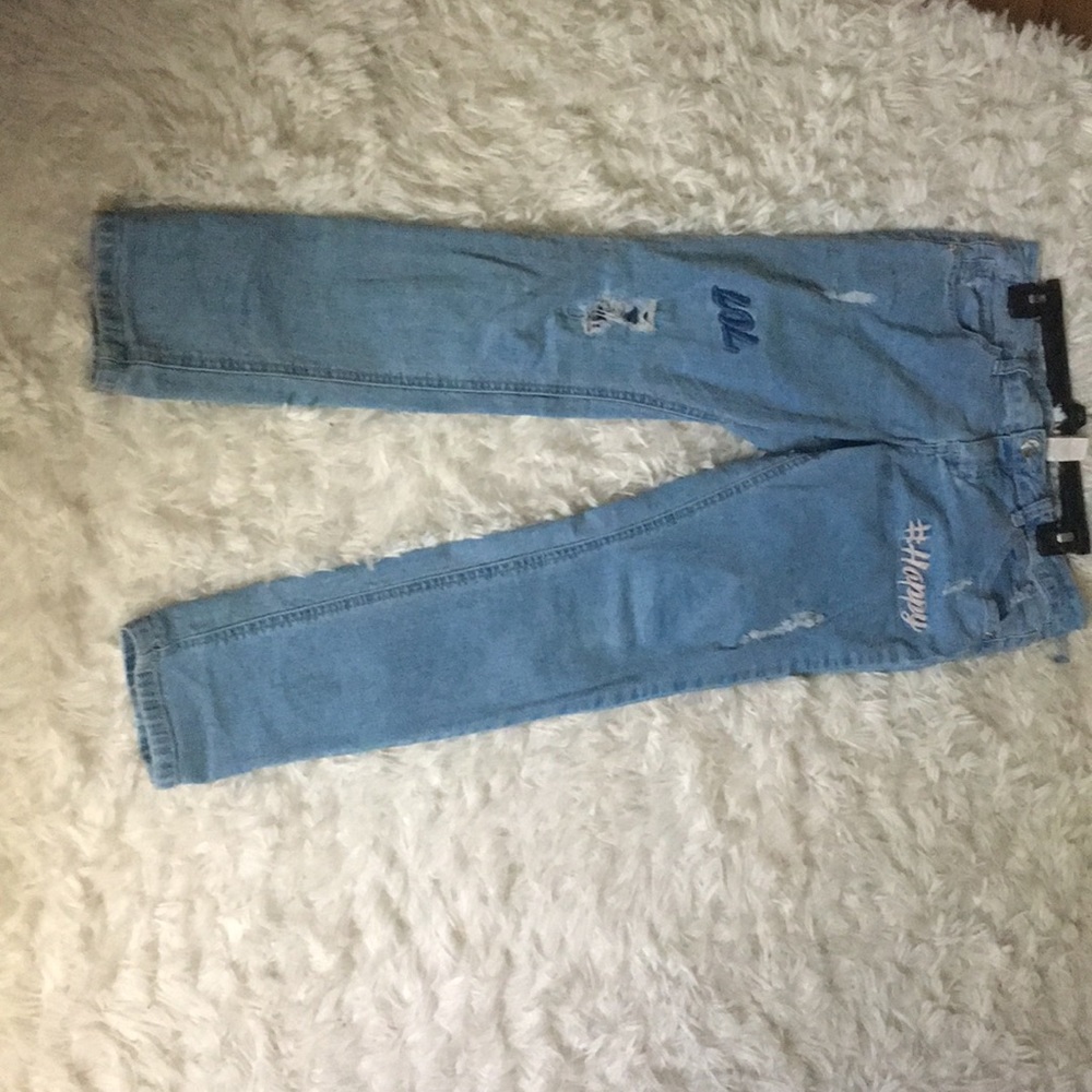 pair of justice jeans